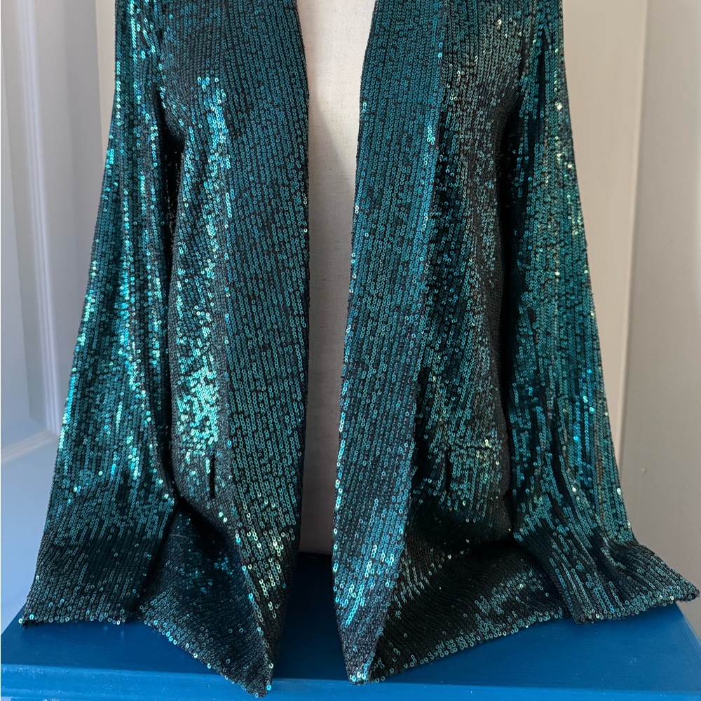 Sequin open front blazer.